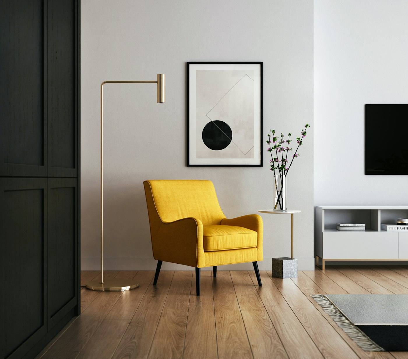 A quiet corner of the house with a chair, books and warm afternoon light.